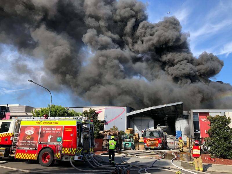 St Marys factory fire emergency response, massive blaze in Sydney, hazardous smoke warning, LPG explosion risk, firefighters battling intense flames